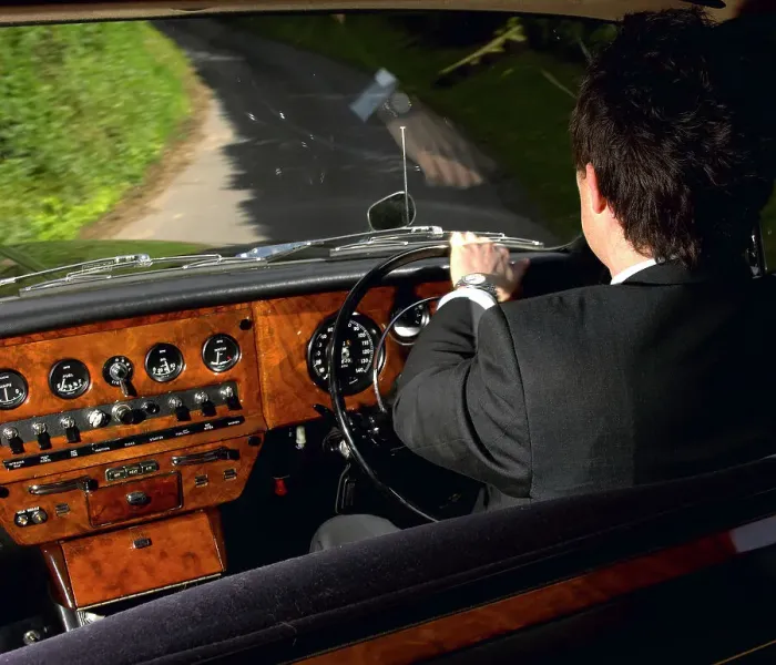 Framed Print : Chauffeur driving 1970 Daimler vanden plas DS 420 limousine Framed Print : Chauffeur driving 1970 Daimler vanden plas DS 420 limousine