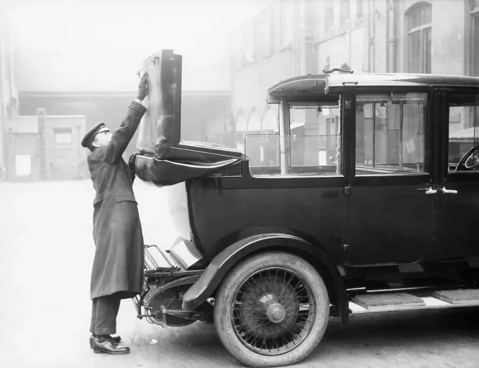 Framed Print : Chauffeur with a partly convertible Daimler