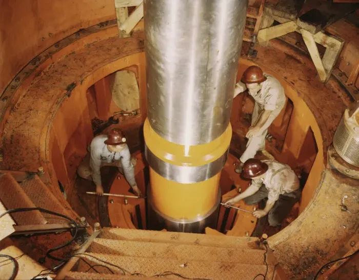 Framed Print : Checking the alignment of a turbine shaft at the top of the guide... Watts Bar Dam, Tenn. 1942. Creator: Alfred T Palmer Framed Print : Checking the alignment of a turbine shaft at the top of the guide... Watts Bar Dam, Tenn. 1942. Creator: Alfred T Palmer