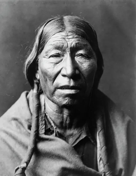 Framed Print : Cheyenne male, facing front, hair in wrapped braids, blanket around shoulders, c1910. Creator: Edward Sheriff Curtis Framed Print : Cheyenne male, facing front, hair in wrapped braids, blanket around shoulders, c1910. Creator: Edward Sheriff Curtis