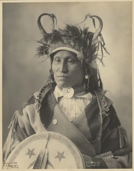 Framed Print : Chief Wets-It of the Assiniboine Nation, 1898. Creators: Adolph F. Muhr, Frank A. Rinehart Framed Print : Chief Wets-It of the Assiniboine Nation, 1898. Creators: Adolph F. Muhr, Frank A. Rinehart