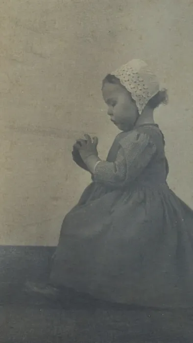 Framed Print : Child with apple, c1900. Creator: Ema Spencer Framed Print : Child with apple, c1900. Creator: Ema Spencer