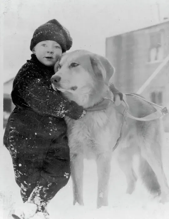 Framed Print : Child with dog, between c1900 and c1930. Creator: Unknown Framed Print : Child with dog, between c1900 and c1930. Creator: Unknown