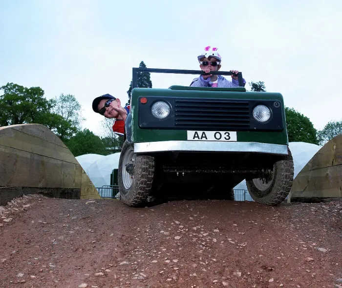 Framed Print : Child driving a toy Land Rover Framed Print : Child driving a toy Land Rover