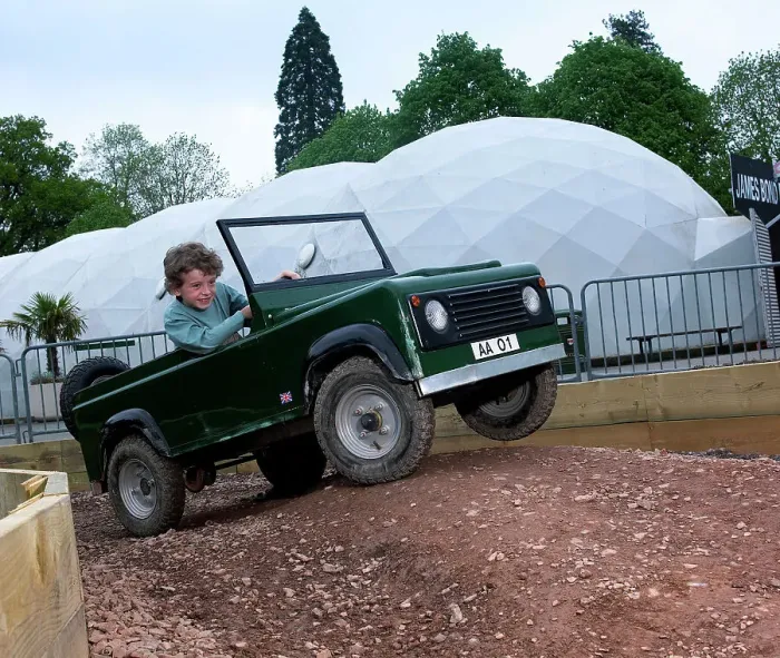 Framed Print : Child driving a toy Land Rover Framed Print : Child driving a toy Land Rover