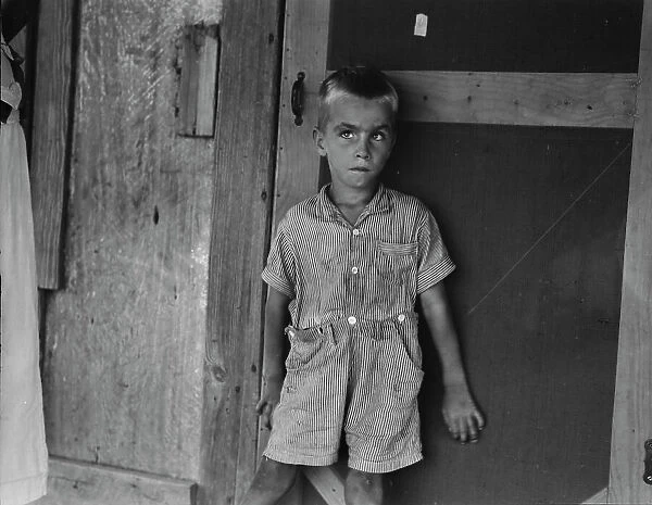 Child of sharecropper family near Cleveland, Mississippi, 1937. Creator: Dorothea Lange