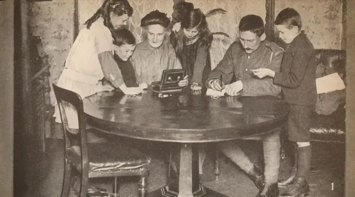 Framed Print : Children emptying their money-boxes to invest in war loan, c1917, (1935) Framed Print : Children emptying their money-boxes to invest in war loan, c1917, (1935)