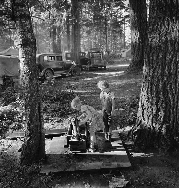 Children in large private bean pickers camp, near West Stayton, Marion County, Oregon, 1939. Creator: Dorothea Lange