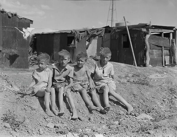Children of migrant cotton field workers from Sweetwater, Oklahoma, 1937. Creator: Dorothea Lange
