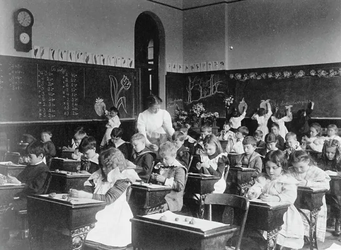 Framed Print : Children modeling clay at desks and drawing on blackboard in Washington, D.C. classroom, (1899?). Creator: Frances Benjamin Johnston