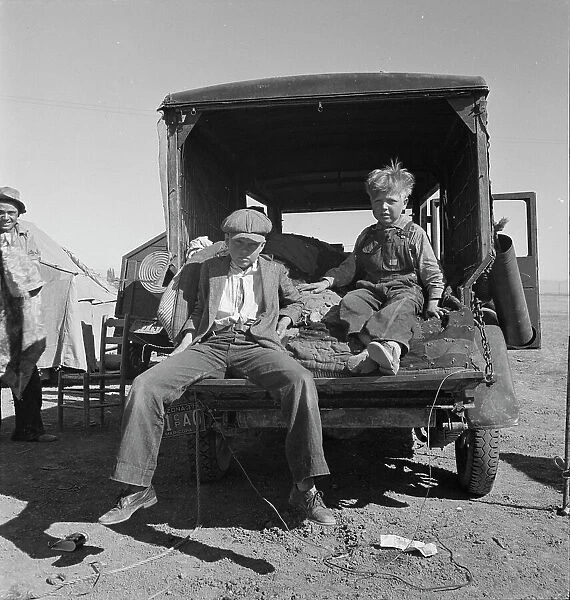 Children of Oklahoma migrants in agricultural workers camp near Calipatria, California, 1937. Creator: Dorothea Lange