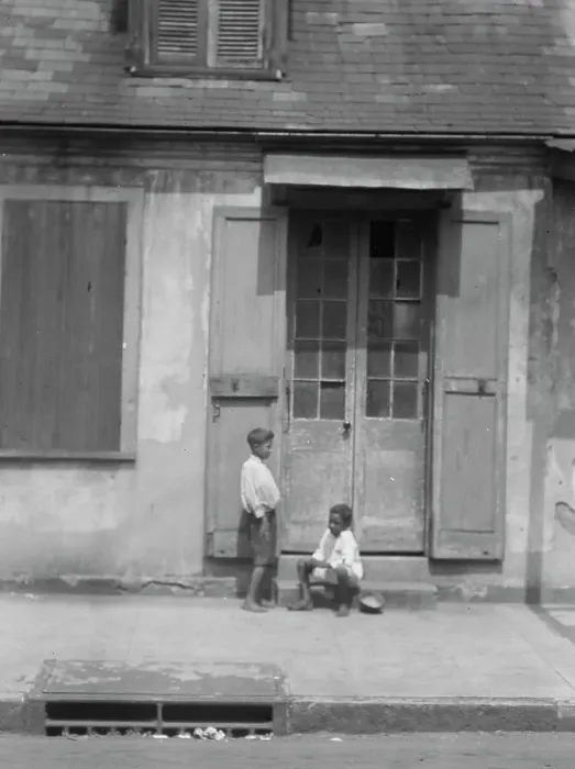 Framed Print : Two children outside a door with shutters in the French Quarter, New Orleans, between 1920 and 1926. Creator: Arnold Genthe Framed Print : Two children outside a door with shutters in the French Quarter, New Orleans, between 1920 and 1926. Creator: Arnold Genthe