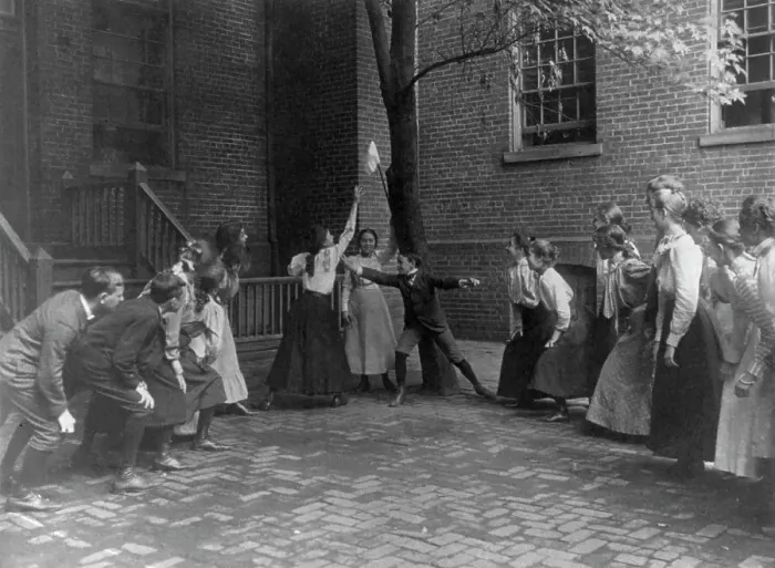Framed Print : Children playing game with handkerchief on stick in school yard, Washington, D.C. (1899?). Creator: Frances Benjamin Johnston Framed Print : Children playing game with handkerchief on stick in school yard, Washington, D.C. (1899?). Creator: Frances Benjamin Johnston