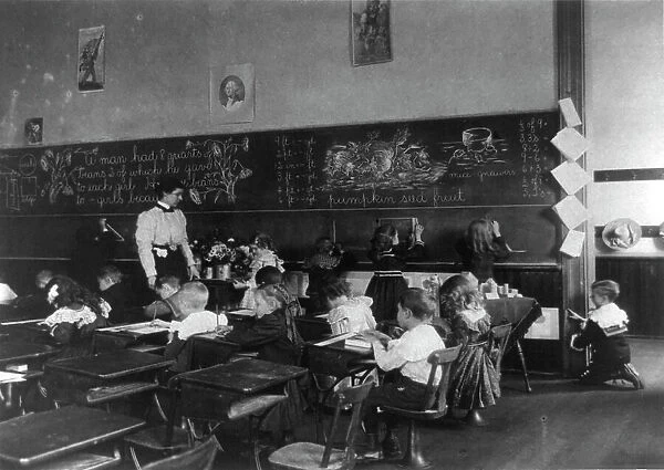 Children in school in Washington, D.C. - studying mathematics, (1899?). Creator: Frances Benjamin Johnston