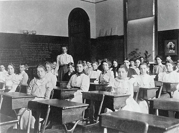 Children seated in classroom, Washington, D.C. (1899?). Creator: Frances Benjamin Johnston