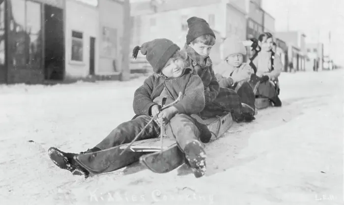 Framed Print : Children sleigh riding, between c1900 and c1930. Creator: Unknown Framed Print : Children sleigh riding, between c1900 and c1930. Creator: Unknown