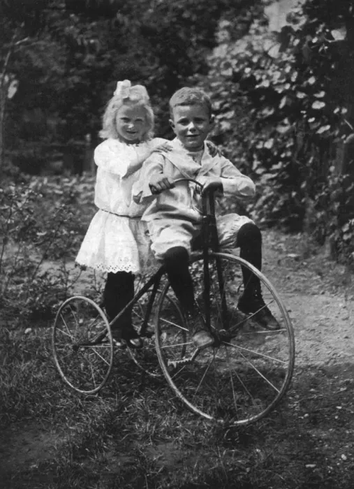 Framed Print : Two children on a tricycle, 1911-1912. Artist: CW Perry Framed Print : Two children on a tricycle, 1911-1912. Artist: CW Perry