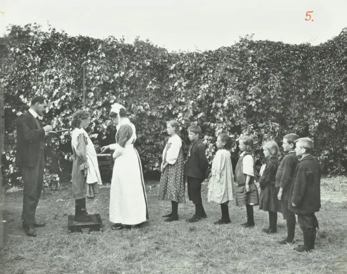 Framed Print : Children being weighed in the garden, Montpelier House Open Air School, London, 1908 Framed Print : Children being weighed in the garden, Montpelier House Open Air School, London, 1908