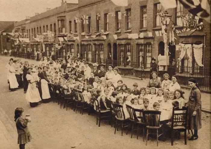 Framed Print : A childrens tea party in an East End Street in London, to celebrate the Treaty of Versailles at t Framed Print : A childrens tea party in an East End Street in London, to celebrate the Treaty of Versailles at t