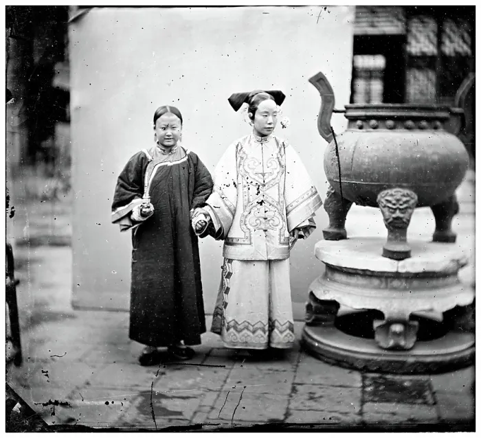 Framed Print : China: a Manchu woman with her maid standing beside a bronze burner, Beijing, 1869. Creator: John Thomson Framed Print : China: a Manchu woman with her maid standing beside a bronze burner, Beijing, 1869. Creator: John Thomson