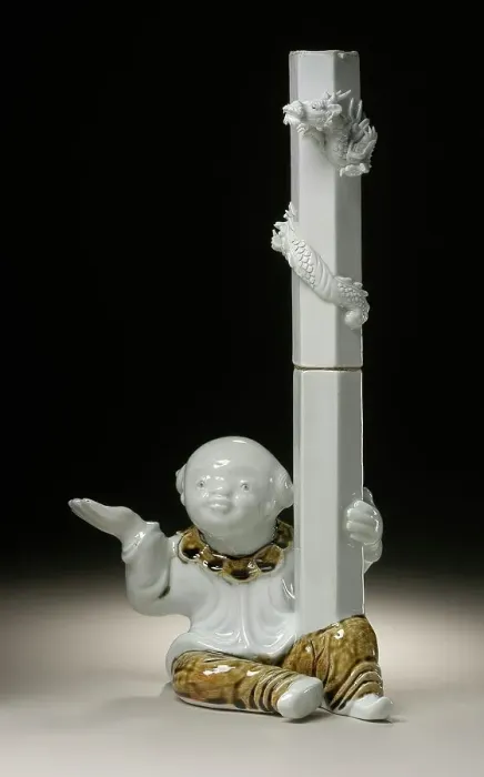 Framed Print : Chinese Boy (karako) Holding Candlestick with Raised Dragon, 19th century. Creator: Unknown