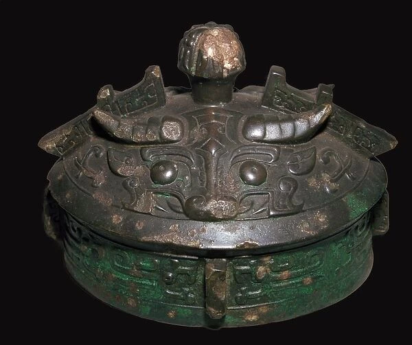Chinese bronze lid of a wine-vessel, 11th century BC. h