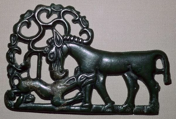 Chinese third century BC bronze plaque, depicting an animal attacking a horse