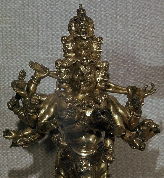 Chinese gilt-bronze statuette of a Dharmapala, 13th century