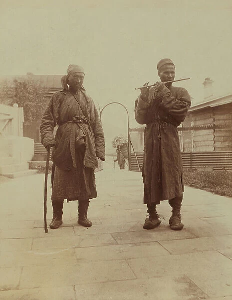 Two Chinese musician street performers in the upper yard, Dom Smith, Vladivostok, Russia, 1899. Creator: Eleanor Lord Pray