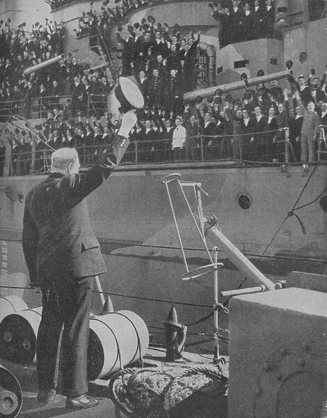 Churchill responds to the cheers from the crew of HMS Prince of Wales, 1941