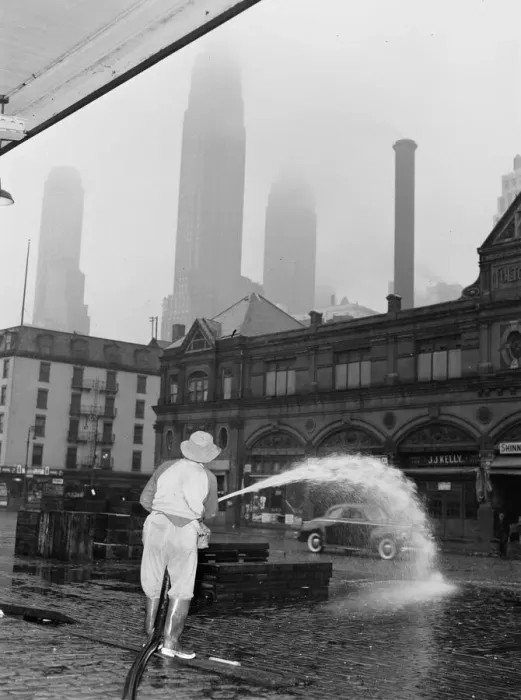 Framed Print : City sanitation workman washing streets at Fulton fish market, New York, 1943. Creator: Gordon Parks Framed Print : City sanitation workman washing streets at Fulton fish market, New York, 1943. Creator: Gordon Parks