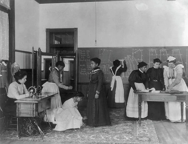 A class in dressmaking, Hampton Institute, Hampton, Virginia, 1899. Creator: Frances Benjamin Johnston