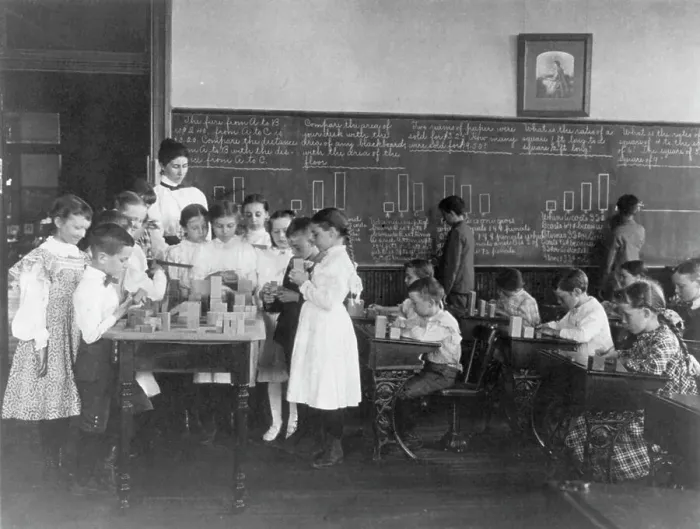 Framed Print : Classroom scene in Washington, D.C. elementary school - children working with blocks... (1899?). Creator: Frances Benjamin Johnston Framed Print : Classroom scene in Washington, D.C. elementary school - children working with blocks... (1899?). Creator: Frances Benjamin Johnston