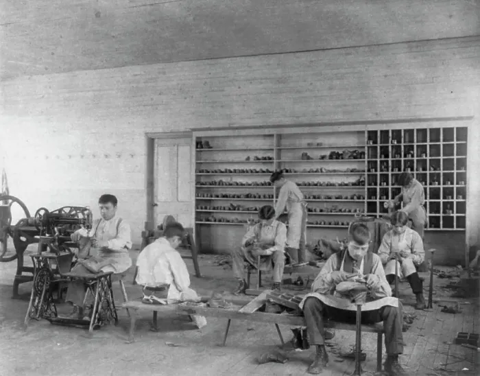 Framed Print : Classroom scenes at Carlisle, Pa. Indian School. Shoe making and repairing; male students, 1901. Creator: Frances Benjamin Johnston Framed Print : Classroom scenes at Carlisle, Pa. Indian School. Shoe making and repairing; male students, 1901. Creator: Frances Benjamin Johnston
