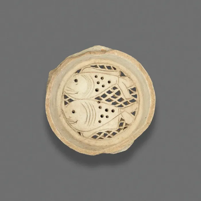 Framed Print : Clay filter with design of fish, Fatimid dynasty (969-1171), 11th-12th century. Creator: Unknown