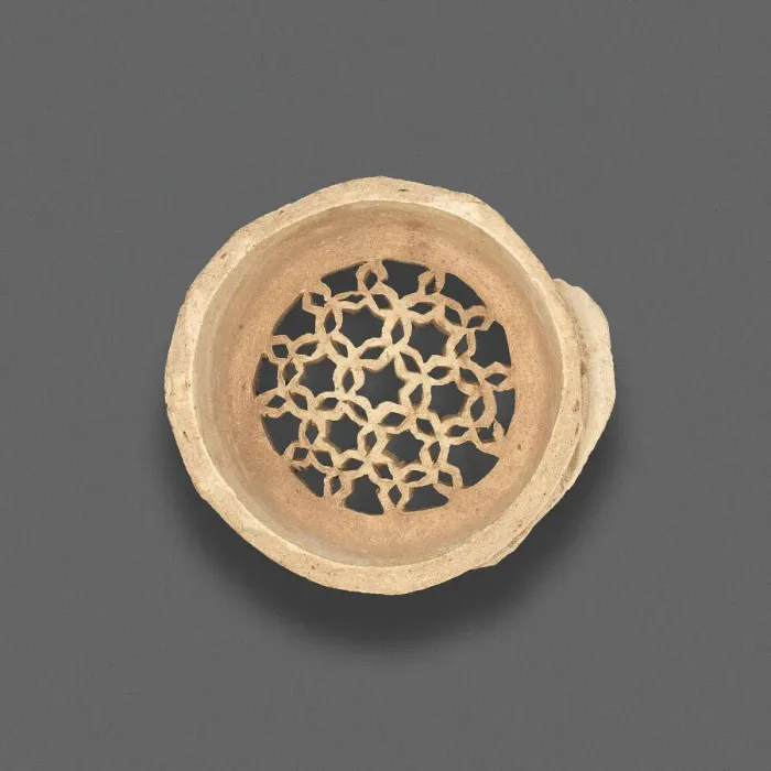 Framed Print : Clay filter with geometric design, Fatimid dynasty (969-1171), 11th-12th century. Creator: Unknown Framed Print : Clay filter with geometric design, Fatimid dynasty (969-1171), 11th-12th century. Creator: Unknown