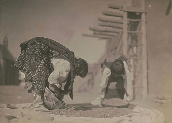 Cleaning wheat-San Juan, c1905. Creator: Edward Sheriff Curtis