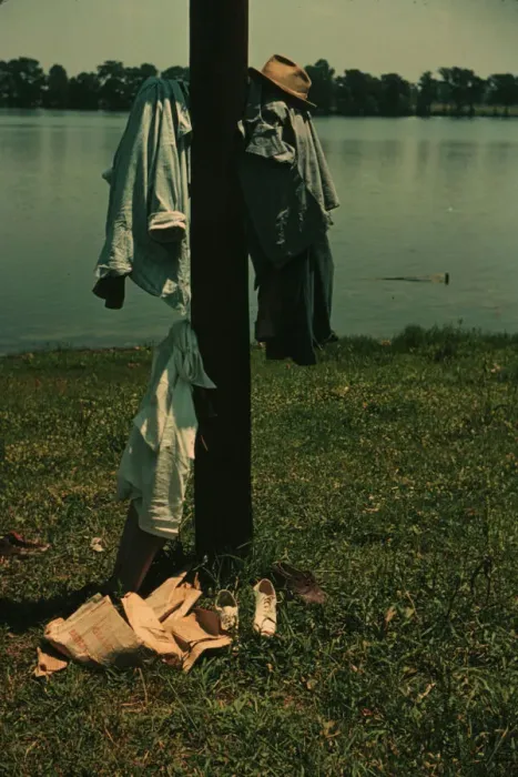 Framed Print : Clothes of swimmers hanging on a telegraph pole, Lake Providence, La. 1940. Creator: Marion Post Wolcott