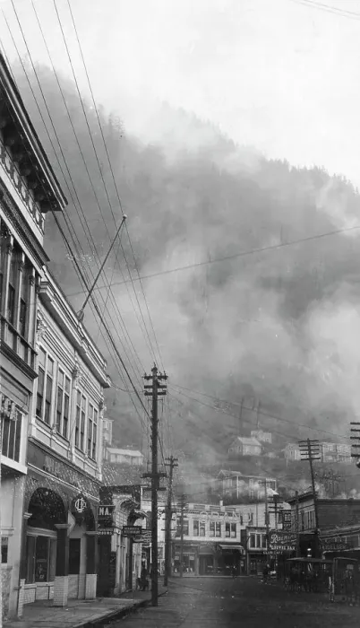 Framed Print : Clouds descending into the main street, between c1900 and 1923. Creator: Unknown Framed Print : Clouds descending into the main street, between c1900 and 1923. Creator: Unknown