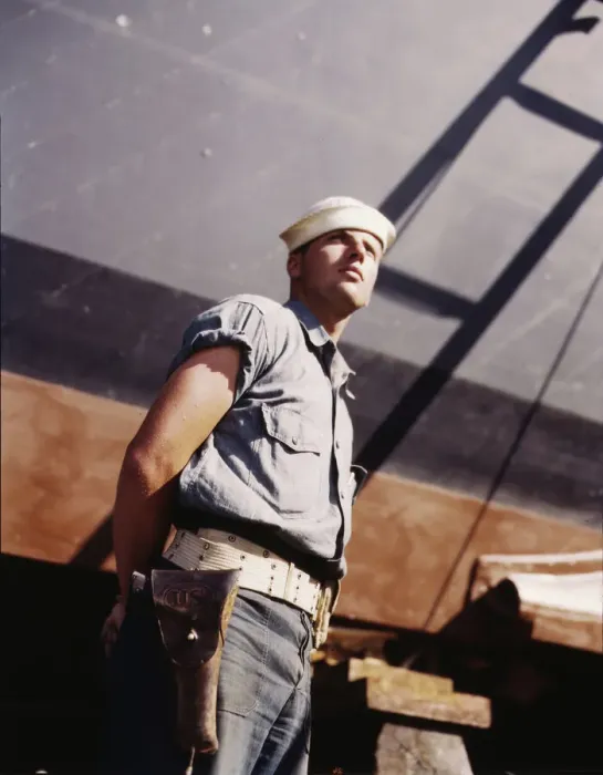 Framed Print : Coast Guardsman standing watch over 78-foot torpedo... Higgins Industries, Inc. New Orleans, 1942. Creator: Howard Hollem Framed Print : Coast Guardsman standing watch over 78-foot torpedo... Higgins Industries, Inc. New Orleans, 1942. Creator: Howard Hollem