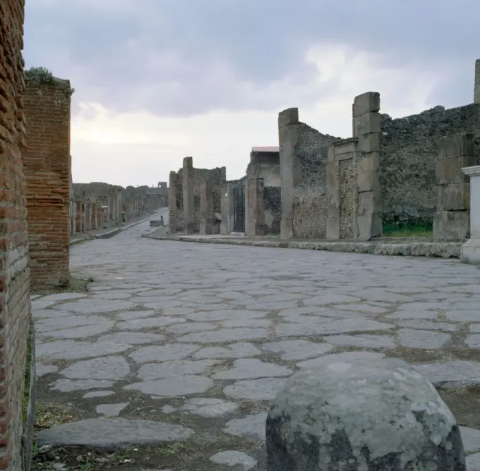 Framed Print : A cobblestone Roman road in Pompeii, Italy Framed Print : A cobblestone Roman road in Pompeii, Italy