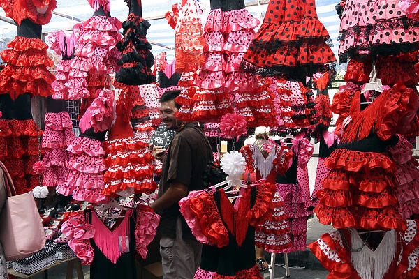 Colourful flamenco dresses for sale in a market, Mallorca, Spain