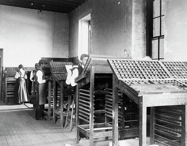 Compositors working in printing shop, Hampton Institute, Hampton, Virginia, 1899 or1900. Creator: Frances Benjamin Johnston