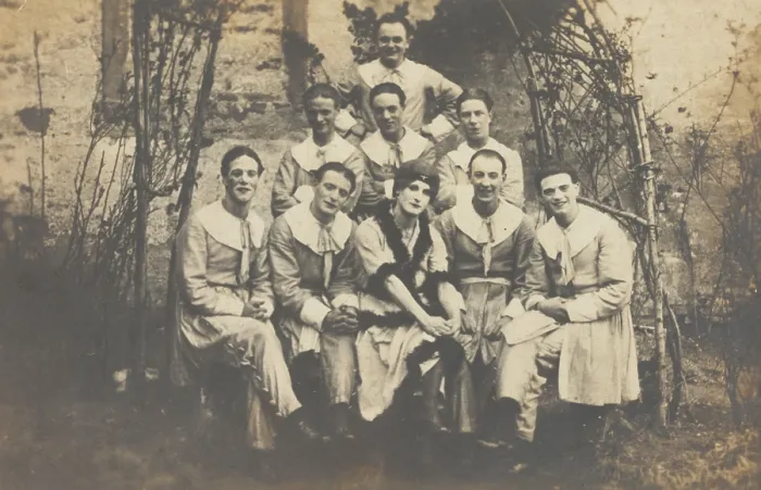 Framed Print : Concert party performers, one in drag, pose for a group portrait, (between 1910 and 1919?). Creator: Unknown Framed Print : Concert party performers, one in drag, pose for a group portrait, (between 1910 and 1919?). Creator: Unknown