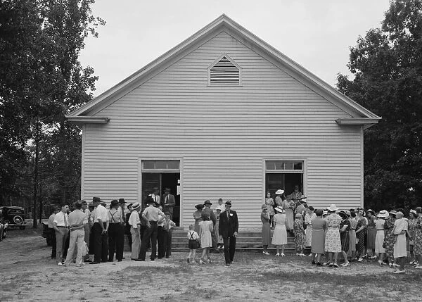 Congregation gathers in groups...Wheeleys Church, Person County, North Carolina, 1939. Creator: Dorothea Lange