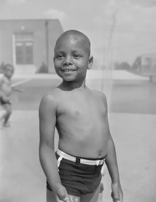 Framed Print : Cooling off under the community sprayer, Frederick Douglass housing project, Anacostia, D. C, 1942. Creator: Gordon Parks Framed Print : Cooling off under the community sprayer, Frederick Douglass housing project, Anacostia, D. C, 1942. Creator: Gordon Parks