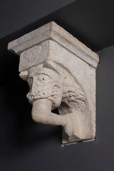 Framed Print : Corbel with Animal Mask with Teeth Fastened on Human Leg from the Monastery Church of Framed Print : Corbel with Animal Mask with Teeth Fastened on Human Leg from the Monastery Church of