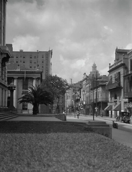 At the corner of Royal and Conti streets, New Orleans, between 1920 and 1926. Creator: Arnold Genthe