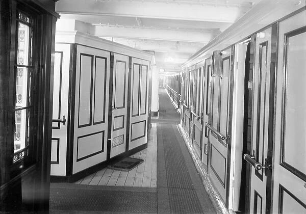 Corridor and cabins on SS Insulinde, 1914. Creator: Kirk & Sons of Cowes
