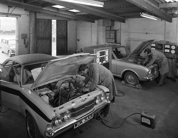 Cortina Mk 2 and Mk3 GT in a garage being serviced  /  modified, 1972